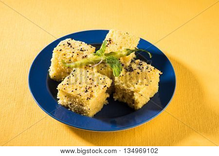 Gujrati famous snack made up of gram flour, semolina called khaman Dhokla
