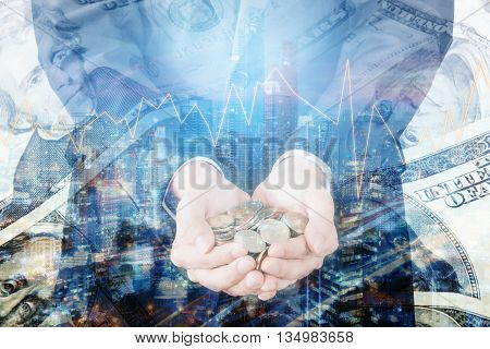 Double exposure of cityscape and businessman collect many coins on hands with trading graph finance and banking concept