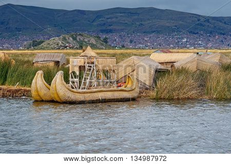 Traditional village on floating Uros islands on lake Titicaca in Peru South America