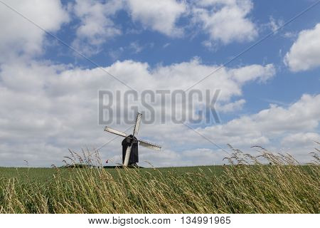 Historic Danish windmill called Pibe Moelle.