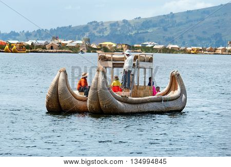 Traditional Village On Floating Islands On Lake Titicaca In Peru, South America