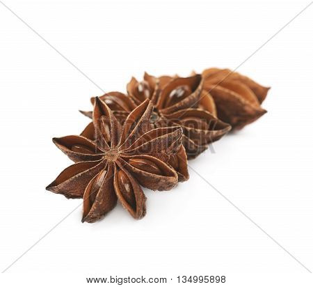 Pile of multiple Chinese star anise seeds, composition isolated over the white background