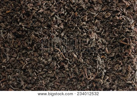 Dark Loose Leaf Tea Background, Black Golden Leaves Blend Texture Pattern Closeup Detail, Horizontal