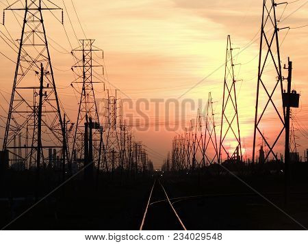 Sunset Over The Railroad With Industrial Overtones