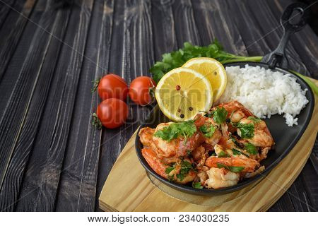 Roasted Shrimps With Lemon, Garlic,herbs And White Rise, Seafood Shelfish Shrimps Prawns Grilled Wit
