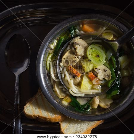 Mushroom Soup In A Metal Plate On A Tray