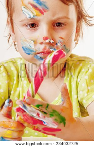 Funny Portrait Of Little Cute Child Girl Painted In The Face With Candy (childhood, Happynes, Sweets