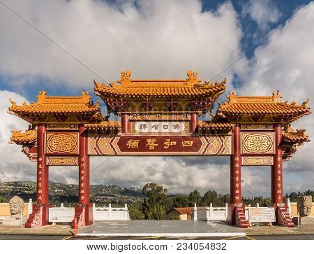 Hacienda Heights, Ca, Usa - March 23, 2018: Red And Ochre Colored Torii Enrance Gate To Hsi Lai Budd