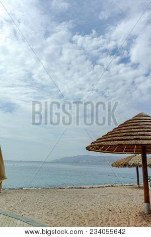 Beautiful Public Sandy Beaches On Red Sea In Eilat With Stro Umbrellas, Luxury Vacation Spa Resorts 