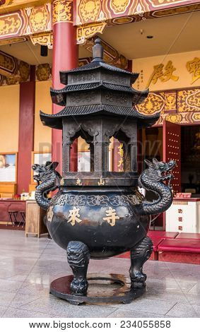 Hacienda Heights, Ca, Usa - March 23, 2018: Black Metal Offer Vessel In Front Of Main Shrine Of Hsi 