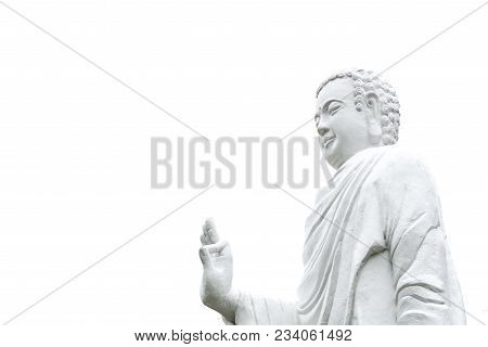 Statue Of Buddha Standing Hand Raised In Gesture Of Vitarka Mudra