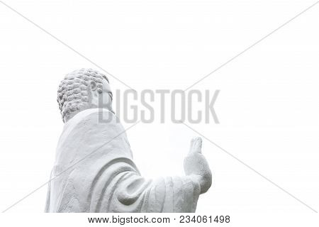 Statue Of Buddha Standing Hand Raised In Gesture Of Vitarka Mudra