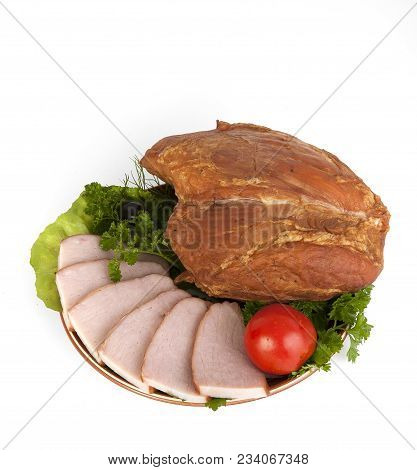 Sliced Smoked Meat On A Plate With Greens. On A White Background.