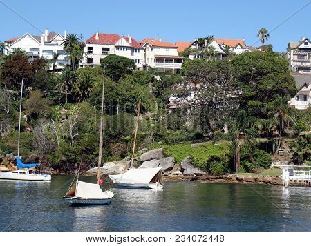 Sydney Harbour, New South Wales, Australia-february 5, 2018:  A Couple Of Yachts Moored In An Inlet 