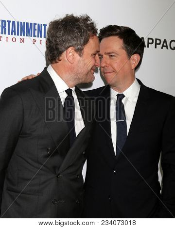 LOS ANGELES - MAR 28:  Jason Clarke, Ed Helms at the 