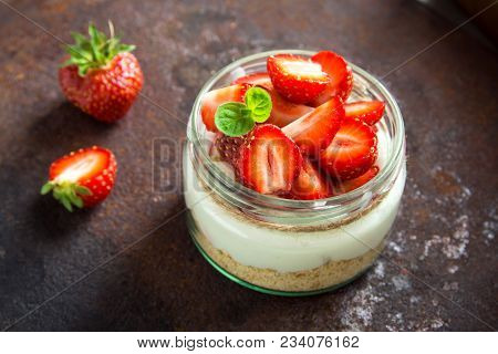 Cheesecake With Strawberries In Jar