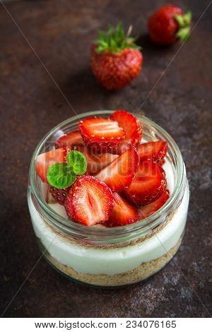 Cheesecake With Strawberries In Jar