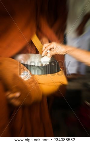 Buddhist Monks Receive Food From The Food To The People Who Have Come Forward In Large Measure, Is L