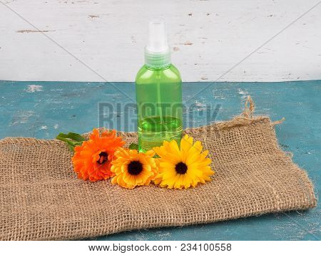Colorful And Crisp Image Of Natural Cosmetics And Common Marigold On Jute