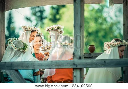 Ritter Weg, Russia, Morozovo, April 2017: Beautiful Girls In The Long Dresses With Veil On The Head 