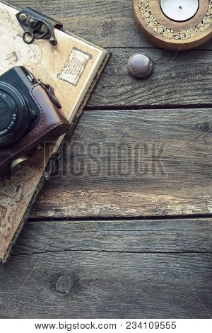 Travel And Vacation Items On Old Wooden Table. Top View