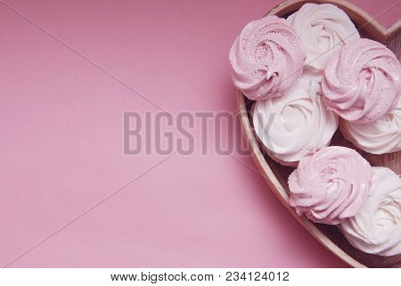 Pink And White Homemade Marshmallows Or Zephyr. Pink Strawberry Desert Over Pink Background.