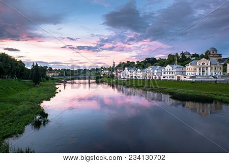 Dramatic sunset sky over the Tvertsa River and its picturesque shores after storm. Russian provincia