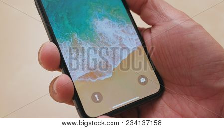 Hong Kong, Hong Kong, 01 March 2018:- Switching on IphoneX 