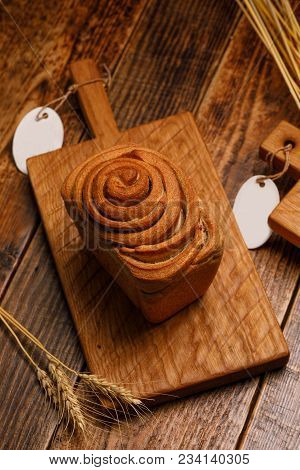 Delicious, Homemade, Beautiful, Bread On A Wooden Background In A Rustic Style. Freshly Baked Bread 