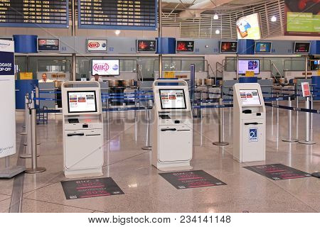 Athens, Greece - May 05, 2015: Self-service Check In Kiosks At Athens International Airport Elefther