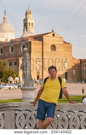 Padova, Italy. Male Tourist At The Plaza De Prato Della Valle In Padua.