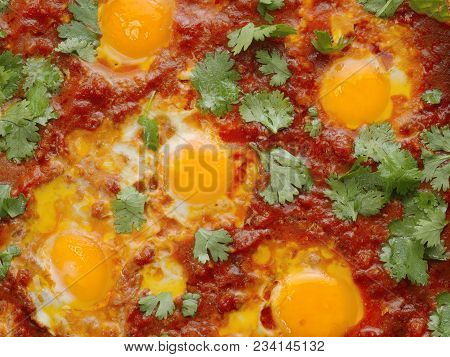 Close Up Of Rustic Middle Eastern Shakshuka Breakfast Food Background