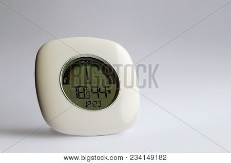 Close View Of Electronic Thermometer Hygrometer On A White Background