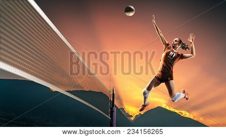 Professional Female Volleyball Player In Action On The Court