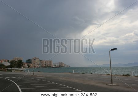 Storm Clouds Over Beach In Spain