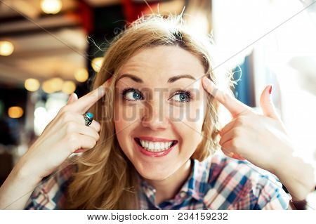 Young Smart Successful Positive Woman Smiling And Looking To Aside