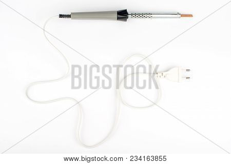 Soldering Iron Close-up. A Soldering Iron On A White Background