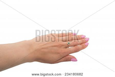 Golden Ring With Emerald And Few Diamonds On Woman's Finger