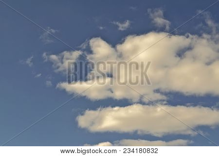 Blue April Sky With Light White Clouds Natural Background