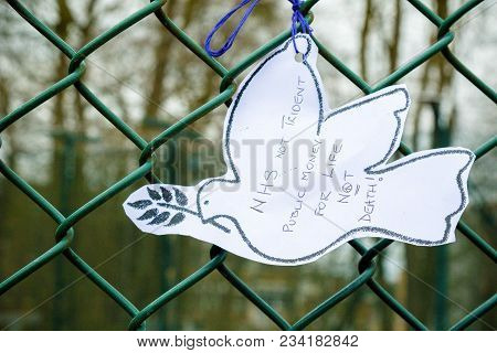 Aldermaston, United Kingdom, 1st April 2018:- Messages Left On The Fence Outside The Main Gate To Th