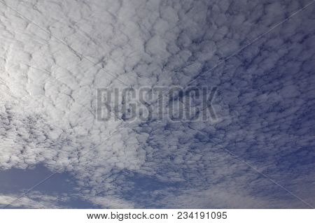 Evening Sky With Light Cirrus Clouds At Sunset
