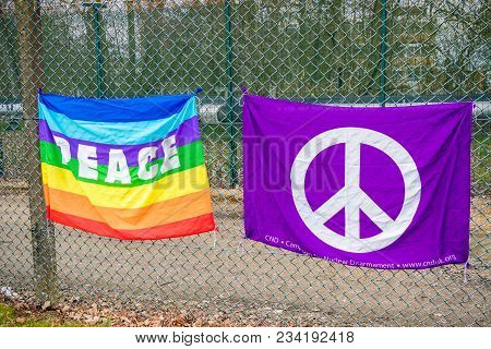 Aldermaston, United Kingdom, 1st April 2018:- Cnd Peace Banners By The Main Gate To The Awe Where Br