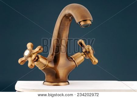 Bronzy Metal Tap Of Retro Design. Faucet.