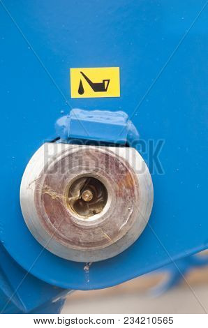 Warning Sign On Agricultural Machinery. Sign Industrial Oiler. The Place In Which During Maintenance
