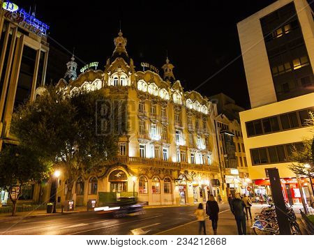 Albacete, Spain - November 12: Locals Stroll At The Plaza Altozano In Front Of The Modernist Gran Ho