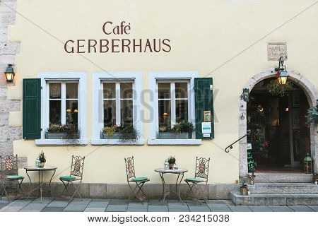 Germany, Rothenburg Ob Der Tauber, December 30, 2017: Gerberhaus Cafe Or Streetside Cafe With Tables