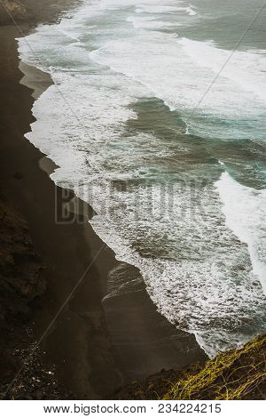 Rough Swash Waves Pounding Bluff Steep Volcanic Shore. Trekking Trail Between Ponto Do Sol And Cruzi