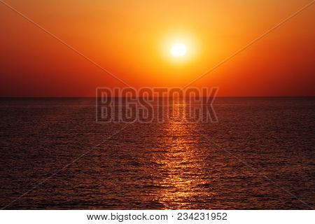 Beautiful Sunset On The Sea With Shallow Waves In Summer Hot Evening Poster Background