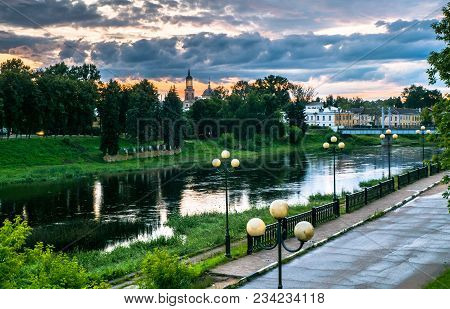 Dramatic sunset sky over the Tvertsa River and its picturesque shores after storm. Russian provincia