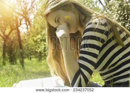 Beautiful Blonge Young Woman Engoying Warm Day Outdoor, Reading, Thinking, Studying Or Working Outdo